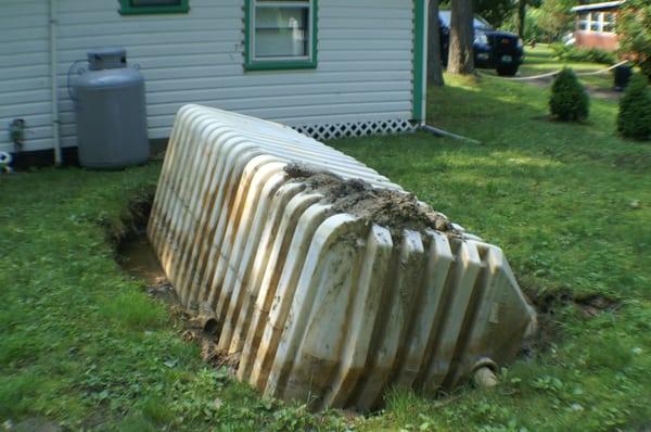 This what happens when the customer did not take my advice, he wanted his septic tank pumped with a high water table.