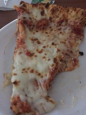 Typical cheese pizza. They apparently don't measure their cheese..