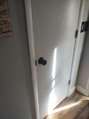 This is the HOLLOW CORE DOOR which has a INTERIOR PRIVACY KNOB that can easily be opened by the other unit.