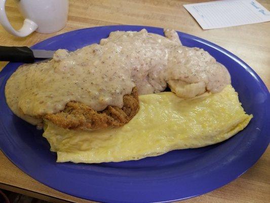 Country fried steak with eggs and biscuits and gravy