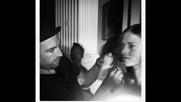 Kris Swanson backstage finishing touch for runway