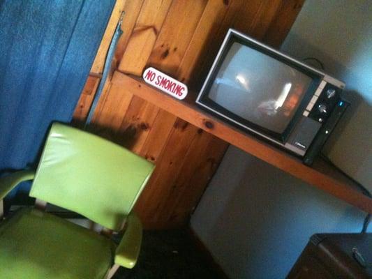 The vintage TV and chair.