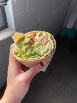 Chipotle Chicken wrap with avocado on a wheat tortilla