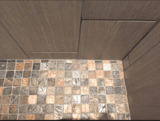 Detail of shower wall and shower floor intersection