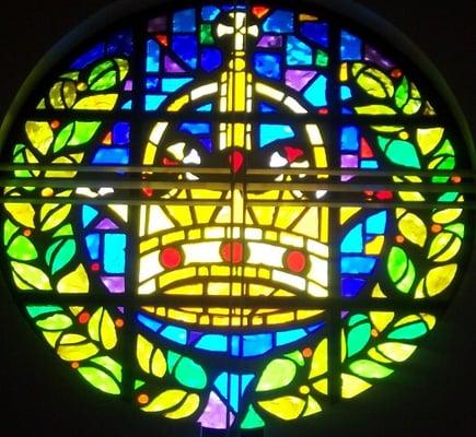 Top of our stained glass windows -- King of Kings crown for Jesus