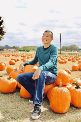 I'm surprised I didn't break the pumpkins while sitting on them