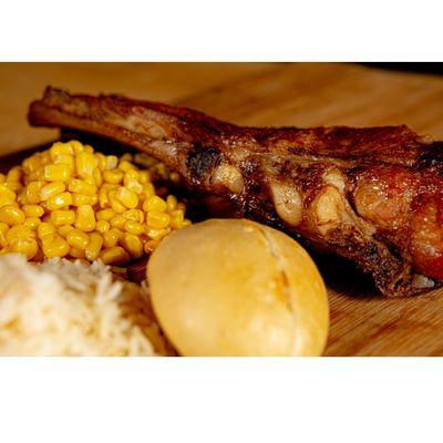 Lonestar rib plate. 2 succulent pork ribs served with white jasmine rice and roasted corn.