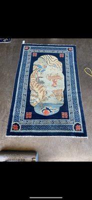 30 years of soil in this hand knotted Chinese rug.  After washing.  Beautifully restored!