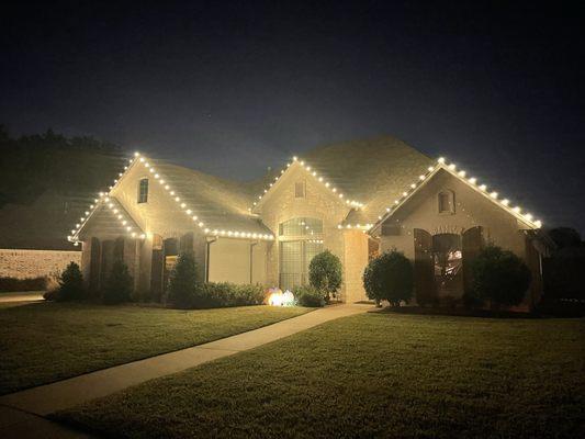 Warm white Christmas lights we provided and installed!