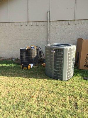 American Standard 17 seer, 2-stage, 4 ton system next to my old 16 yr old unit