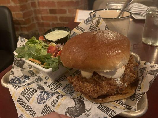 Popcorn chicken sandwich with side salad