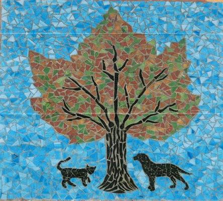 This beautiful mosaic was created by a local artist. It hangs above the front entrance door.