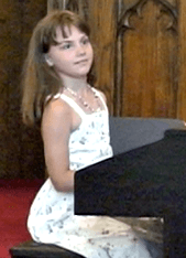 Elementary school age student Brieanna A. performing at the Annual Recital.