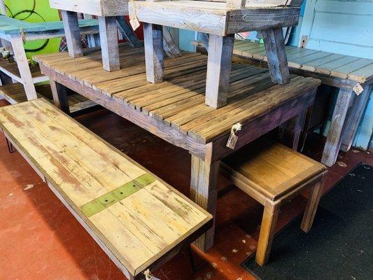 Custom made rustic repurposed benches and tables