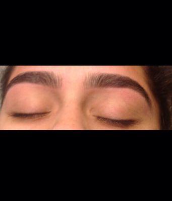 Beautiful eyebrows of a client after threading