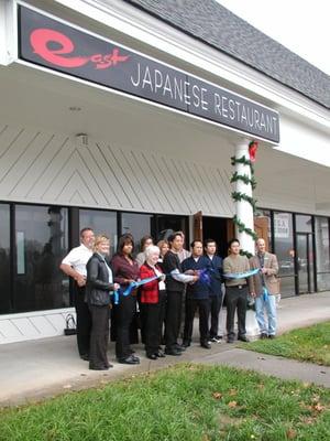 Restaurant Owners, City Officials, and invited guests celebrate the opening of East Japanese Restaurant