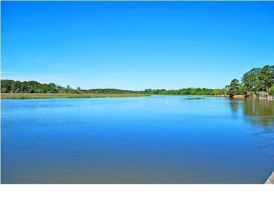 Wishing you could pull your boat up to your dock?  Want really deep water... like 12' at low tide?  This is the house for you!