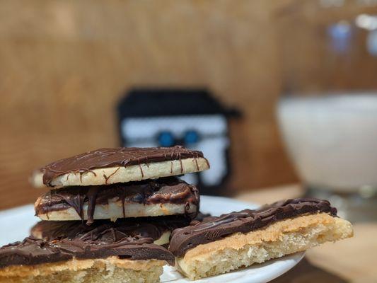 Hang Backs - Vanilla shortbread cookie with sweetened peanut butter and dark chocolate