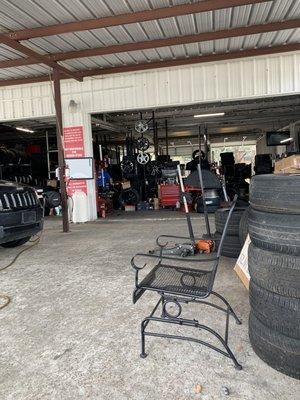 Back of shop with nice chairs to wait.