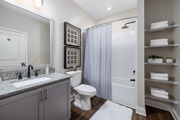 spacious bathroom with linen storage