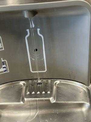 Broken water fountain on third floor runs nonstop.