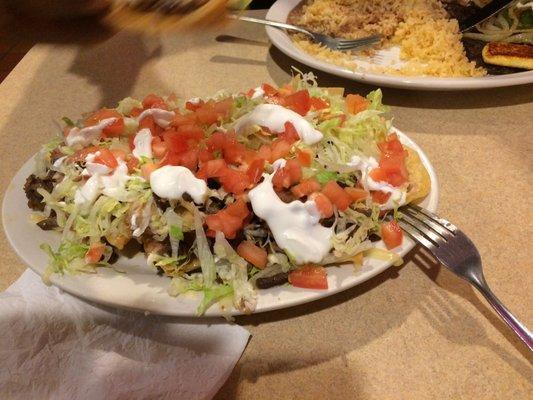 Nachos supreme with steak. Must try!