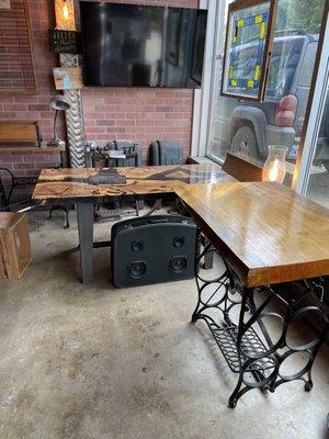 Love this- sewing machine trestle is the base and beautiful wood top.