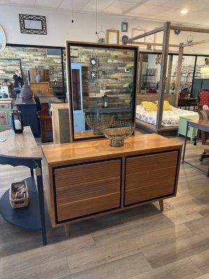 Mid century modern dresser with matching mirror.  Six drawers of solid maple. Matching chest of drawers available separately.