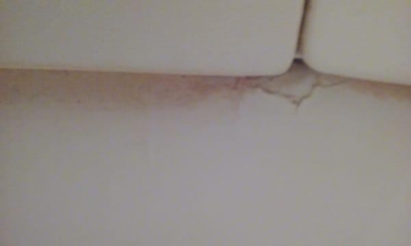 Crack in finish of bathtub taken  the same day   this was supposedly fixed