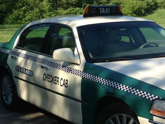 Yellow checker taxi cab