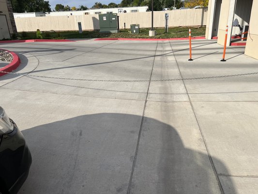 Invisible log chain "directing traffic to not enter main car wash building