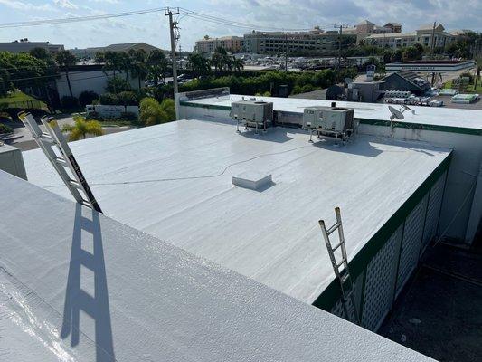 Why reroof a flat roof, when you can recover it.   Using a product similar to Epoxy, we have extended the life span of this roof by 15 years