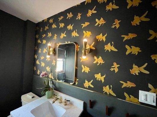 They did an amazing job in our fun bathroom. The wallpaper looks terrific!