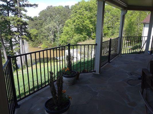 Little fence around patio.