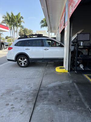 The subie getting a smog checked.