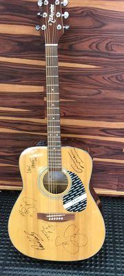 Crosby, Stills, Nash and Young signed Takamine Guitar with case. No COA Purchase from estate.