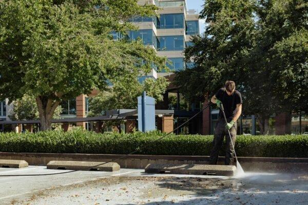 Pressure washing parking lot at Carrilon point, Kirkland WA