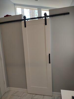 Beautiful barn door added to the master bathroom