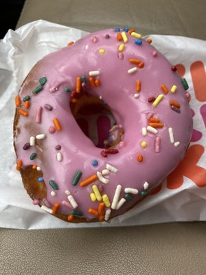 Strawberry frosted sprinkle donut