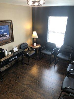 Bright, comfortable waiting room with selection of organic coffee and tea.