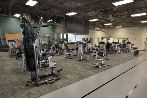 Strength Training equipment on fitness floor.