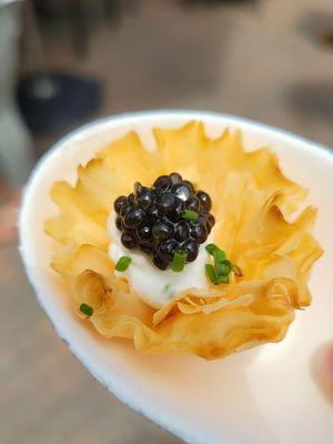 Ostera caviar with lime creme fraiche phyllo cup. Tsar Nicoulai