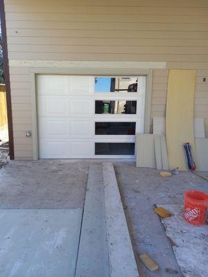 White raised panel with windows  in vertical.