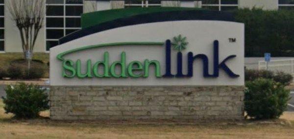 Suddenlink sign in front of actual building at this location