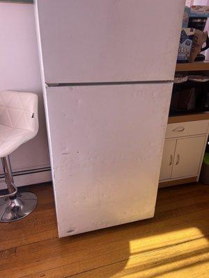 Disgusting refrigerator dirty banged up