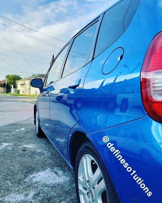 Honda fit washed in a foam bath