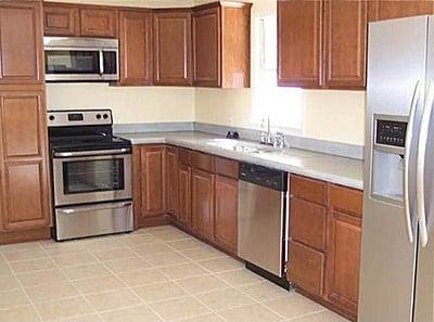 New kitchen: cabinets, countertop, paint and tile floors.