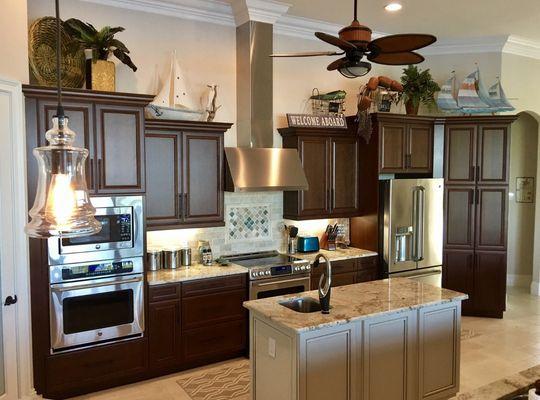 Kitchen cabinetry with stagger and island