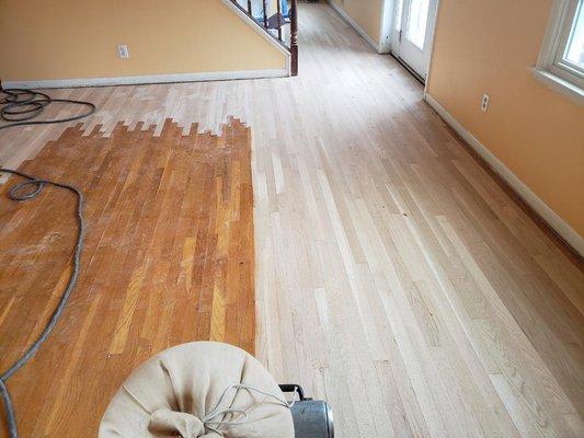 Sanding the first whole house floor.