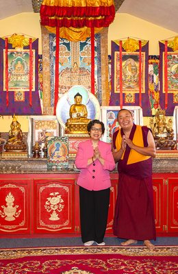 Head monk with a believer